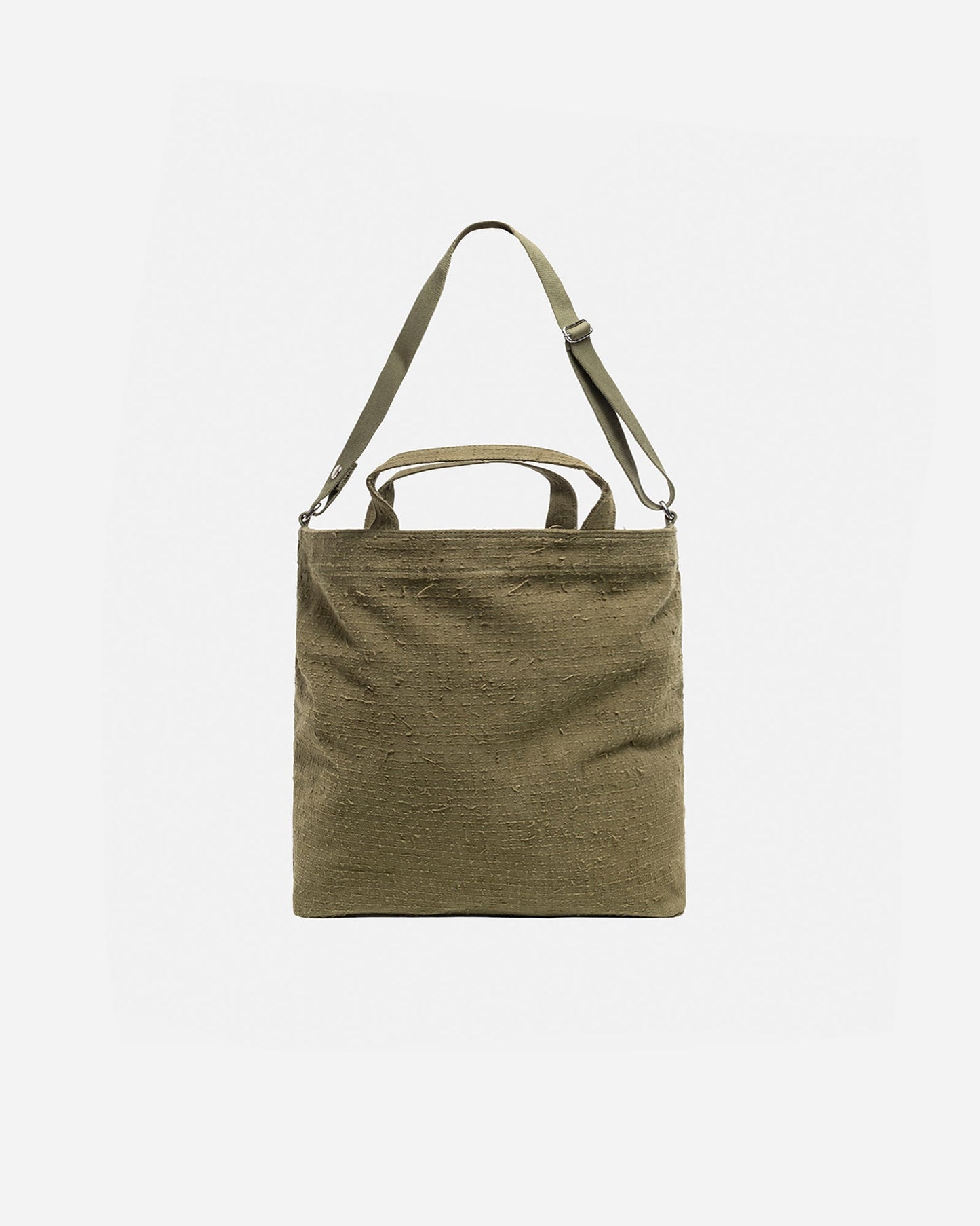 SAC BANDULIÈRE EN FEUTRE AIGUILLETÉ